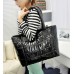 Стеганая сумка лаковая 011297106670black черная