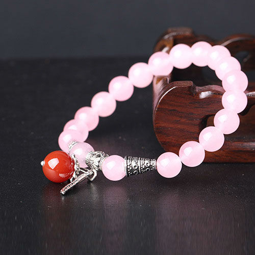 Браслет из натурального камня Кварц розовый с пером